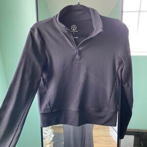 Like new black long sleeve quarter zip with pocket